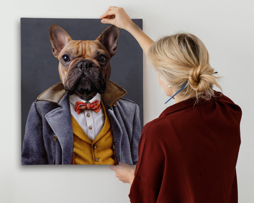 Pet Portrait of a French Bulldog dressed in a stylish, vintage outfit, featuring a gray coat, mustard-yellow vest, white shirt, and red plaid bowtie. The dog's serious expression contrasts humorously with its fashionable attire, giving a whimsical sense of elegance and charm